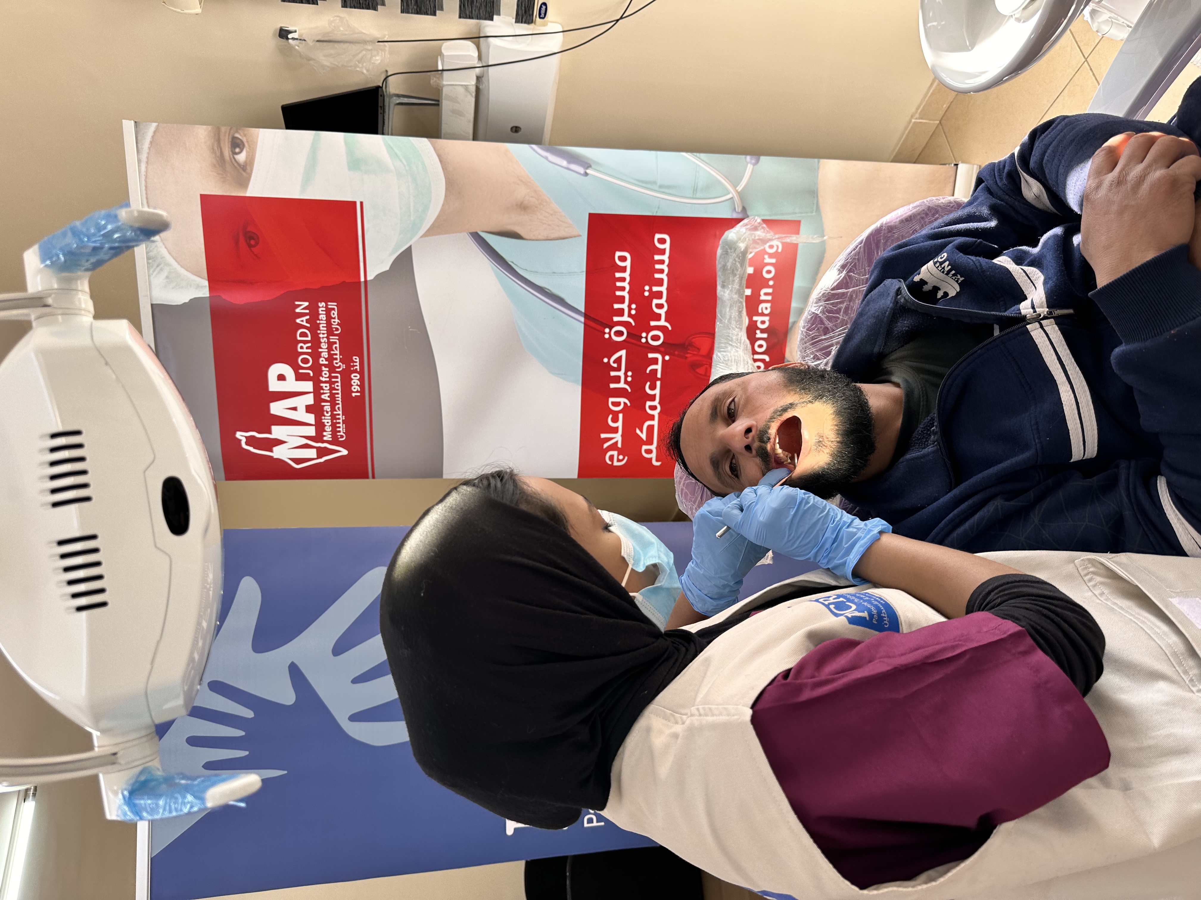 Treating 60 dental patients in Talbieh camp